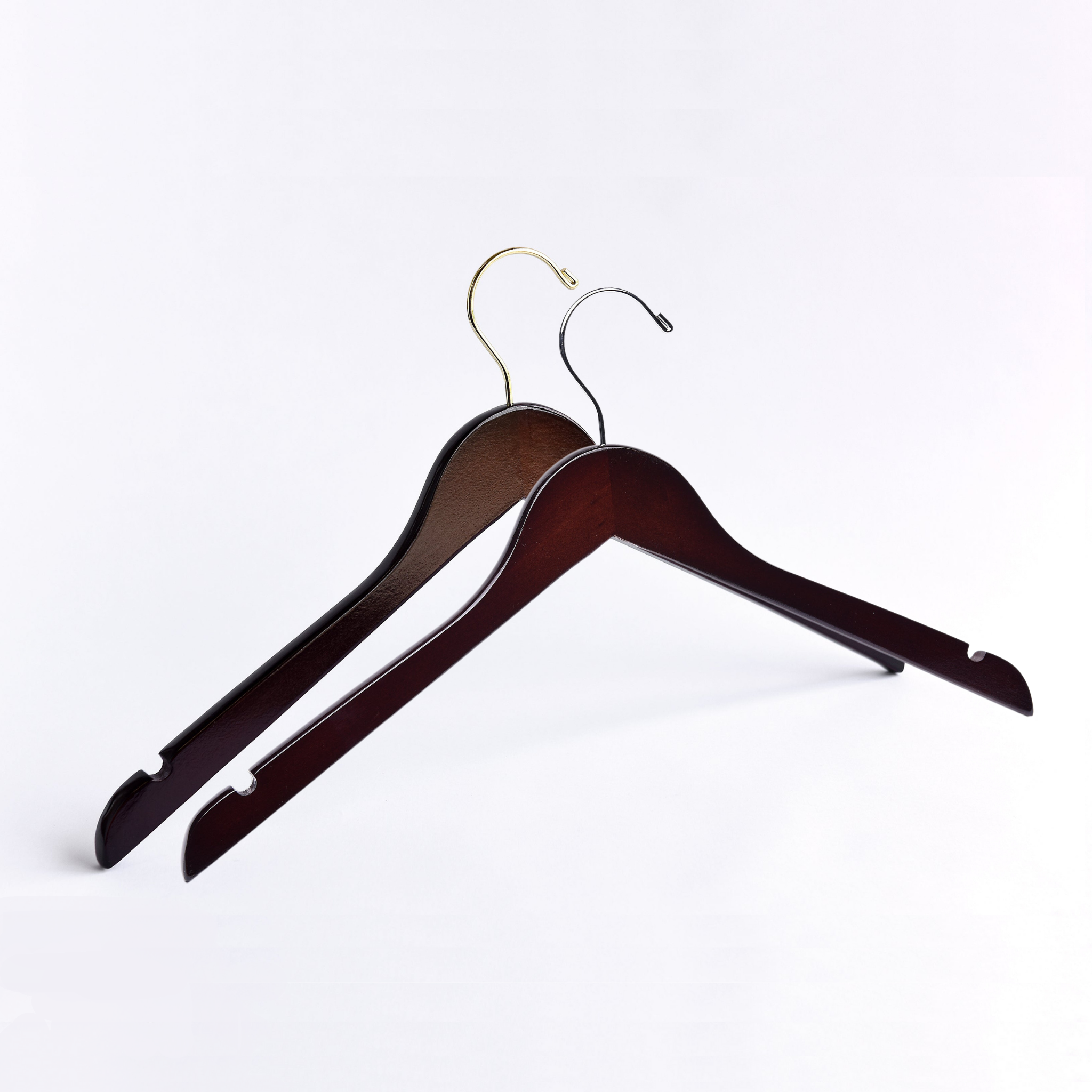 Two Dark Walnut Wooden Adult Clothes Hangers with a silver hook and a gold hook for residential closets and retail stores