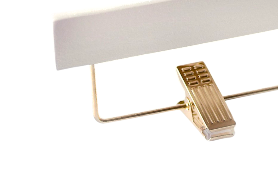 Ivory Wooden Bottom Hanger’s solid select wood and gold anti-stain, anti-slip, adjustable cushion clips for pants