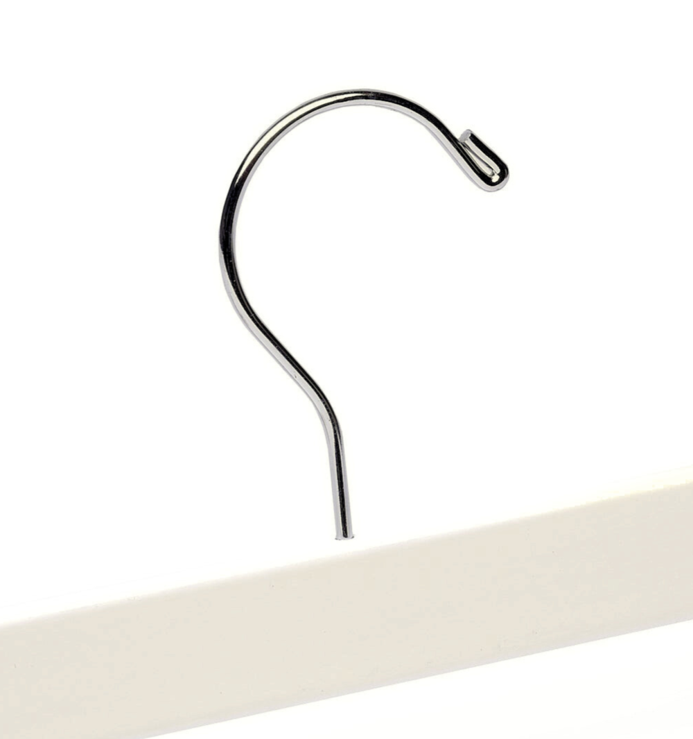 Top of a high quality Ivory Off-White Wooden Bottom Hanger for adults with a silver hook facing to the right