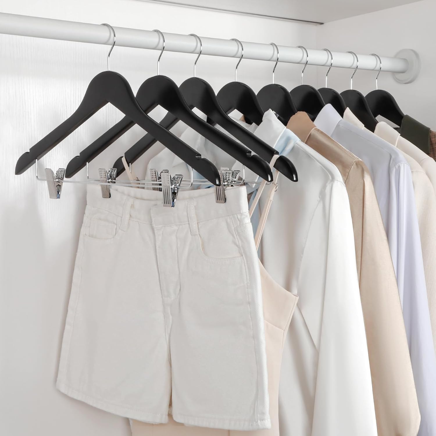 Glossy Black Wooden Combination Hanger with adjustable cushion clips to hang both your top and bottom clothing