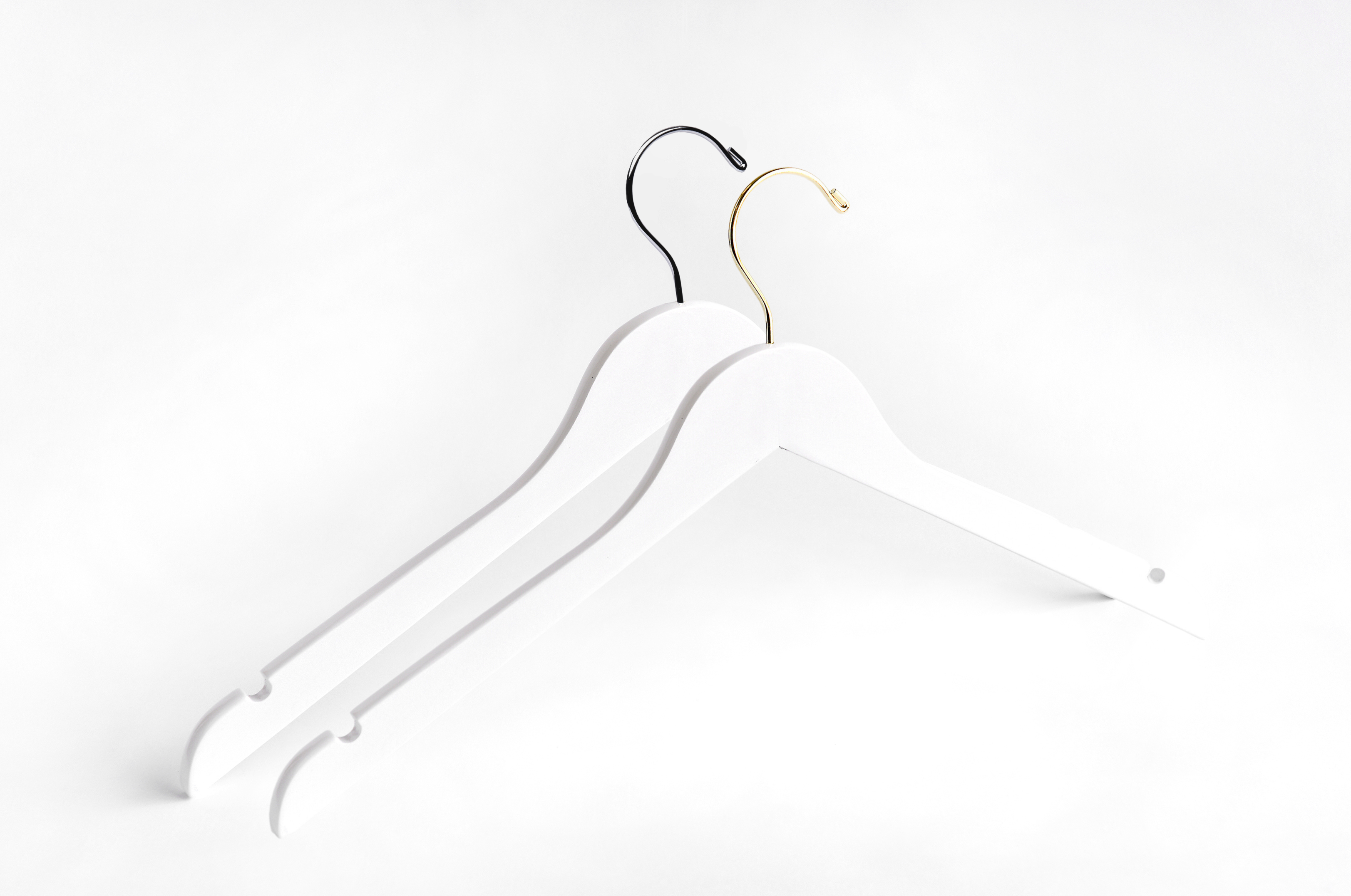 Two White Wooden Adult Clothes Hangers with a silver hook and a gold hook for residential closets and retail stores