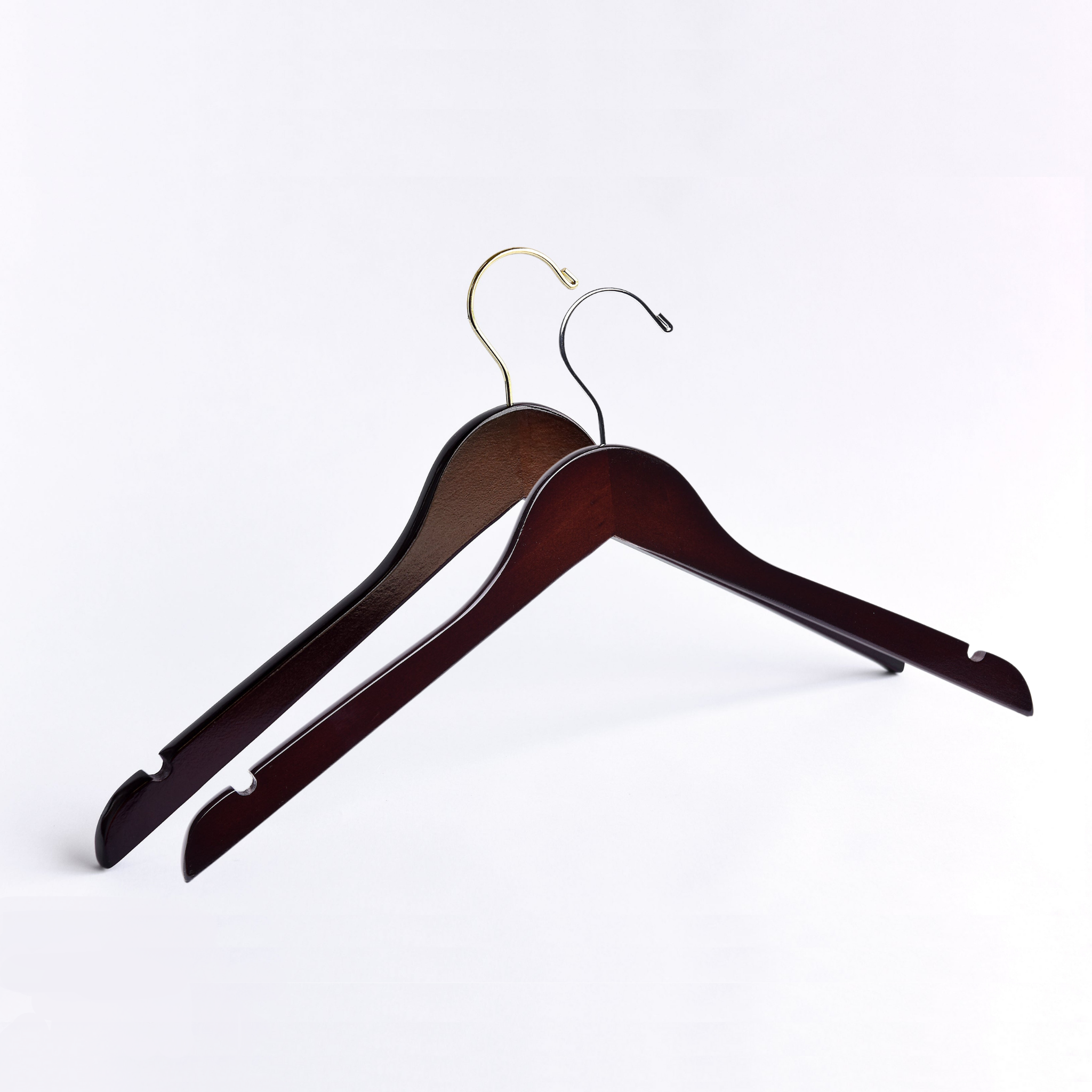 Two Dark Walnut Wooden Adult Clothes Hangers with a gold hook and a silver hook for residential closets and retail stores #hook-color_gold-hook