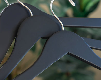 Three Matte Black Wooden Clothes Hangers with silver hooks for custom wedding hanger designers 