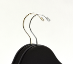 Load image into Gallery viewer, The top of two matte black wood suit hangers with a silver hooked one in front and a gold hooked one in the back #hook-color_silver-hook
