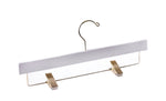 Load image into Gallery viewer, White Wooden Pants Hanger with gold hardware and non-slip cushion clips for home closets and retail spaces #hardware-color_gold
