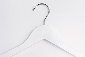Top of Stark White Wooden Clothes Hanger with a silver hook for residential homes and retail spaces #hook-color_silver-hook
