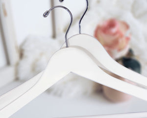 Two White Wooden Suit Hangers with silver hooks for custom bridal hanger designers, home closets, and retail stores #hook-color_silver-hook