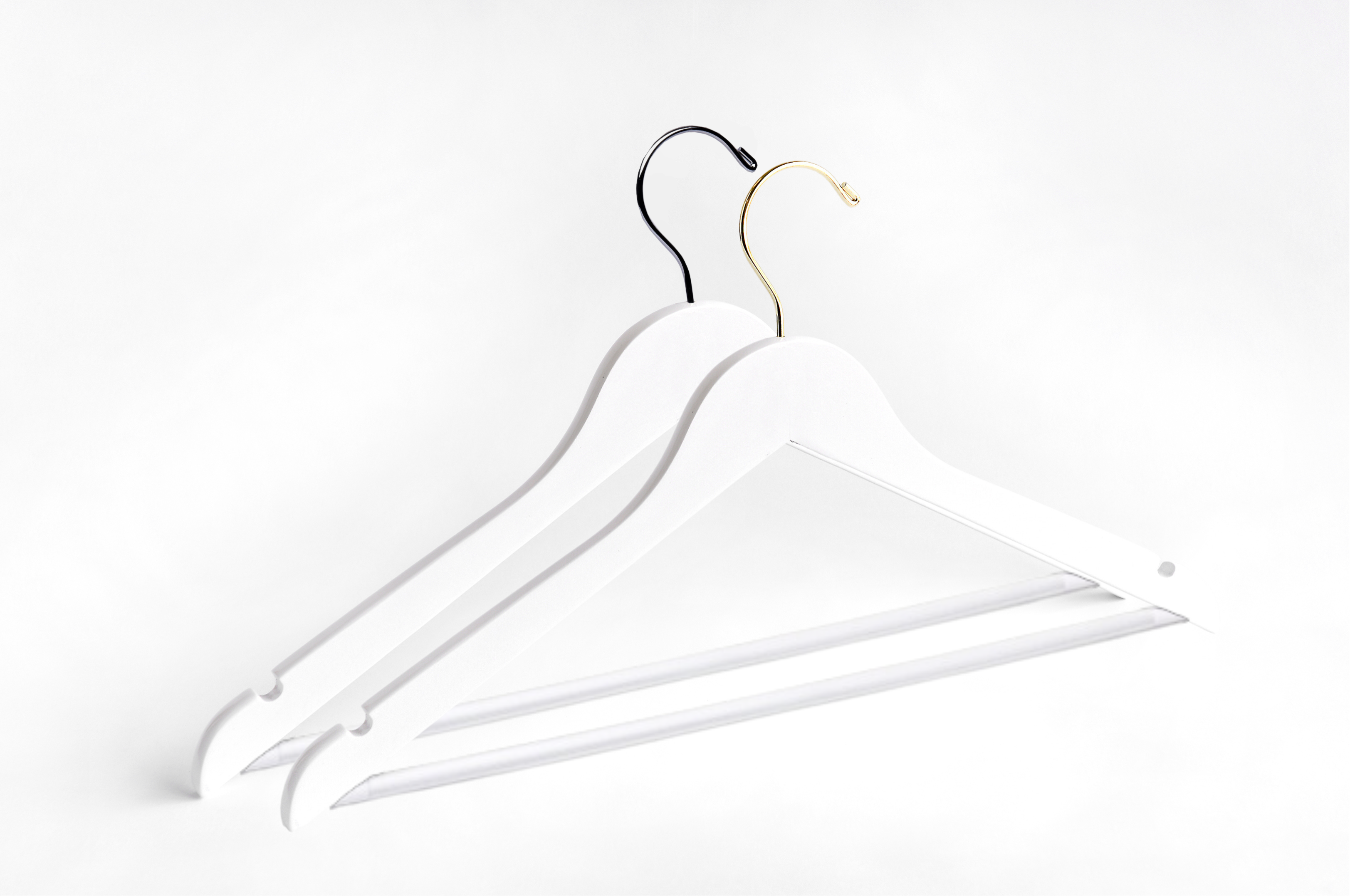 Two White Wooden Adult Flat Suit Hangers with a silver hook and a gold hook for residential closets and retail stores #hook-color_gold-hook
