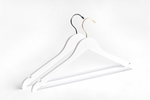 Load image into Gallery viewer, Two White Wooden Adult Flat Suit Hangers with a silver hook and a gold hook for residential closets and retail stores #hook-color_gold-hook

