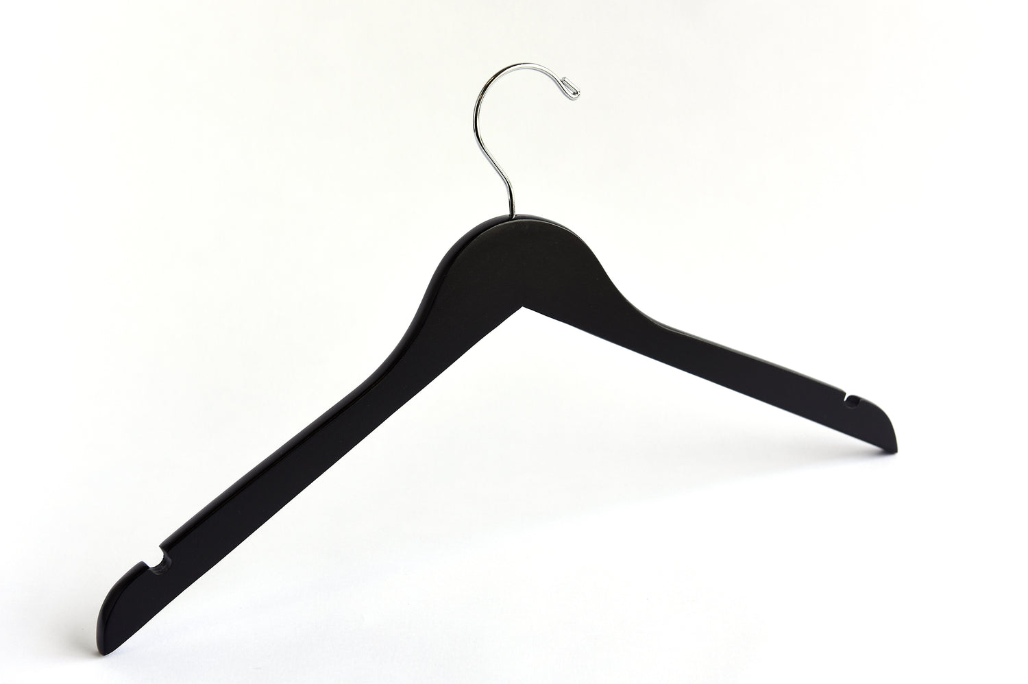 Matte Black Wooden Clothes Hanger with a silver hook and shoulder notches for custom bridal hanger designers 