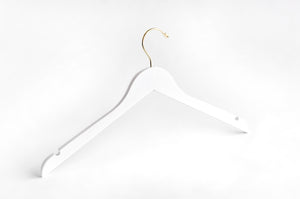 White Wooden Clothes Hanger with a gold hook and shoulder notches for custom bridal hanger designers #hook-color_gold-hook