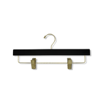 Load image into Gallery viewer, Matte Black Wooden Pants Hanger with a gold hook and non-slip cushion clips for home closets and retail spaces #hardware-color_gold

