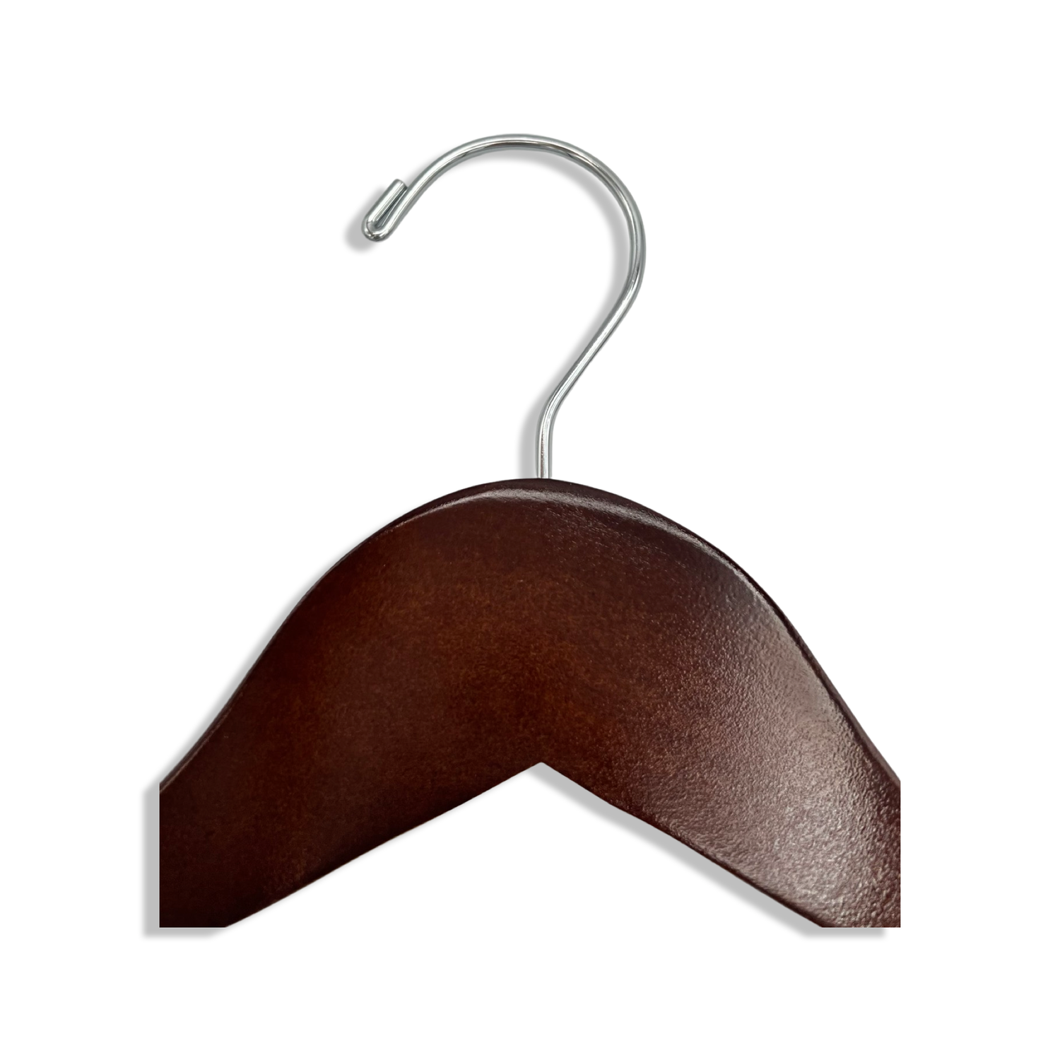 Top of Dark Walnut Wooden Clothes Hanger with a silver hook facing to the left 